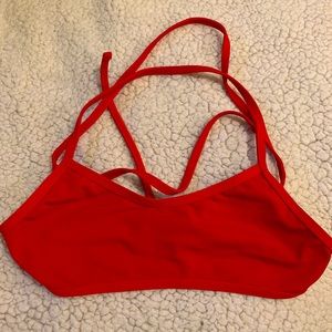 Jolyn clothing: red tie back scoop top